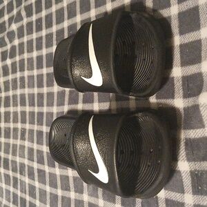 Nike: Black and White Slide Sandals
